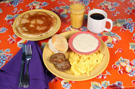 Flying Biscuit signature dishes The High Flyer BreakfastDirty BirdChicken and Waffle